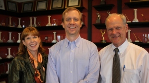 Jay Graves, center, with MP&F Public Relations partners Katy Varney and David Fox. 